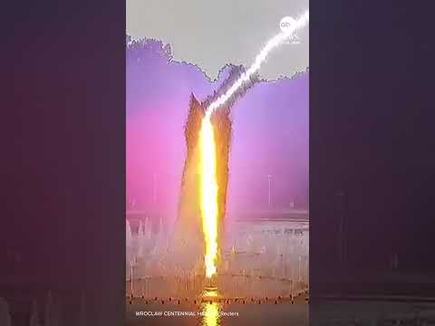 Surveillance footage captured the moment lightning struck a fountain