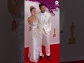 John Krasinski and Emily Blunt stun on the red carpet in all white.