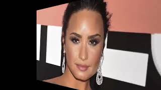 Demi Lovato is shows off her best body ever and her boobs are spilling out of a low cut swimsuit.