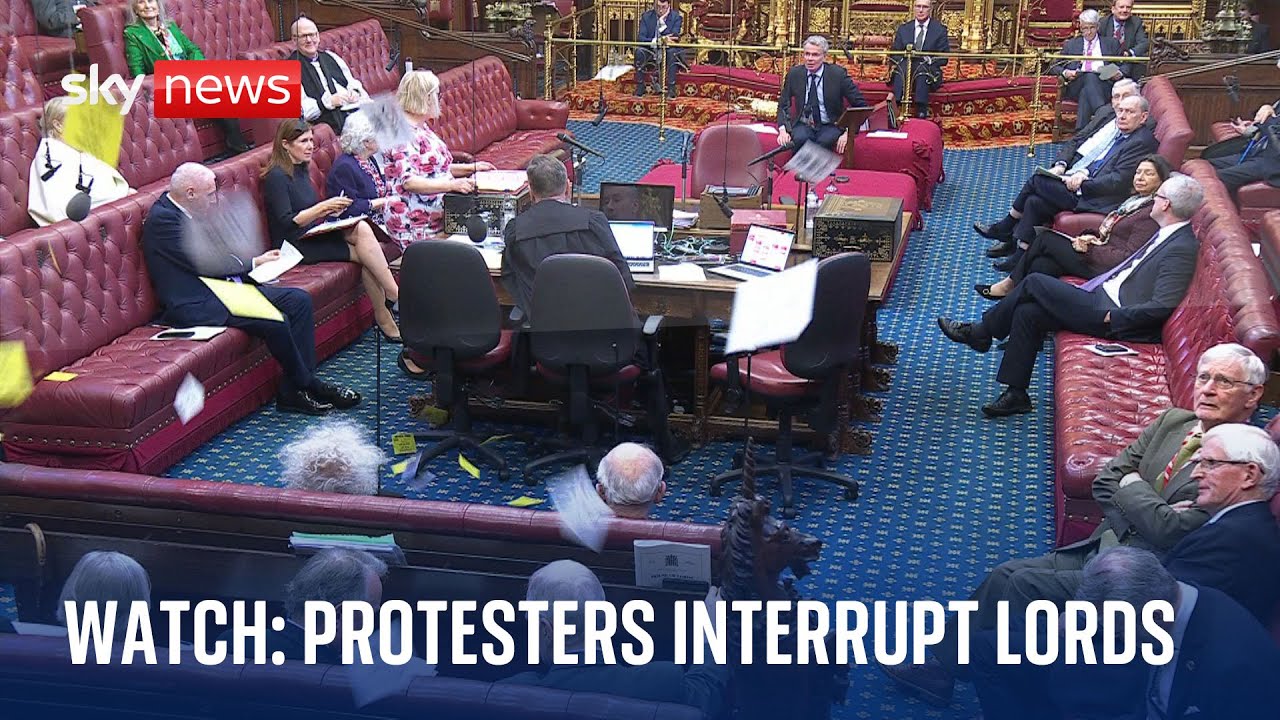 House of Lords: Watch as protesters shouting 'Lords out, people in' throw papers at peers