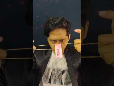 dengan-kekuatan-pikiran-uang-tembus-karet-trik-sulap-karet