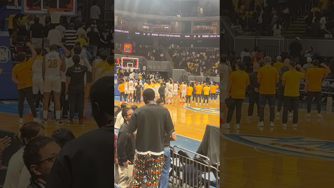 Hail Alma Mater: Tigers singing the UST Hymn after bowing to the UP Fighting Maroons in a tight game.