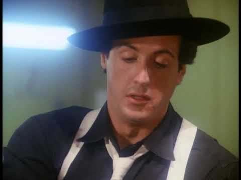 Thumbnail of the video: Sylvester Stallone getting beat up in Death Race 2000