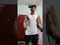17 year old flexing biceps
