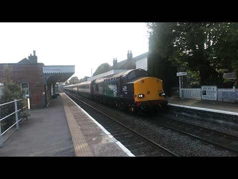 37038 hauls a Greater Anglia Mk3 Set passes through Wymondham