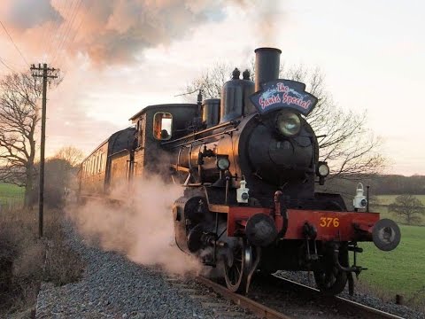 17 December 2016 Santa special on the KESR crossing the level crossing on cranbrook road Tenterden