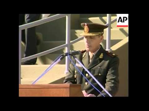 New president reviews troops following  reorganisation