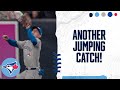 Daulton Varsho jumps into the wall to make another terrific catch!