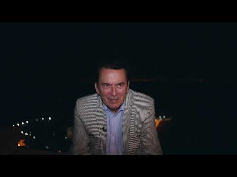 Pierre Guillermo talks to his friend Marco Viani in Sidi Bou Said