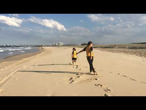 2015 Ejmont Family Walking on the Beach After School