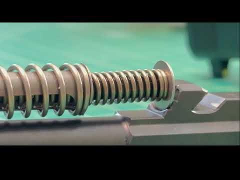 Glock 43X Recoil Spring Assembly  (RSA) and a stainless steel RSA with a side-by-side comparison.