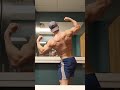 Trained back post workout - posing bodybuilding men's physique