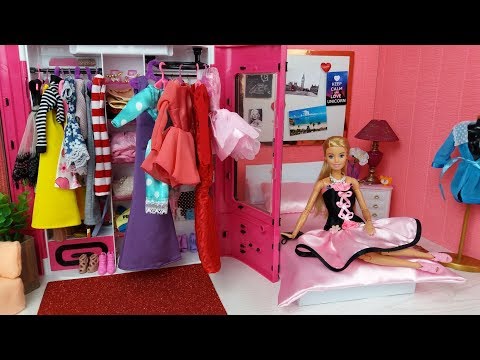 Barbie Doll Morning in a pink Bedroom. Barbie fills her doll wardrobe with new clothes. Barbie video