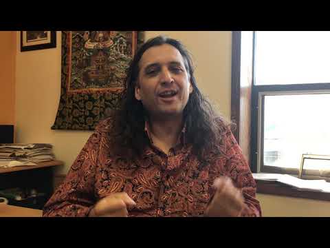 Dr. Ian Wickramasekera discussing the SCEH Midyear Meeting