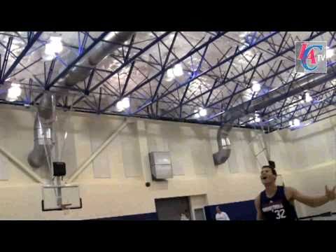 Ryan Gomes makes half court trick shot