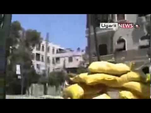 اشتباكات بين عناصر لواء صقور الشهباء وقوات النظام في الإذاعة