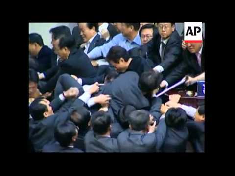 Lawmakers scuffle during parliament session