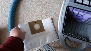 How to change a bag on a Hoover action pets vacuum.