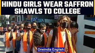 K'taka: Hindu girls wear saffron scarves to protest against Hijab | Oneindia News video
