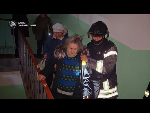 Rescuers in Kharkiv assist victims in aftermath of airstrike | AFP