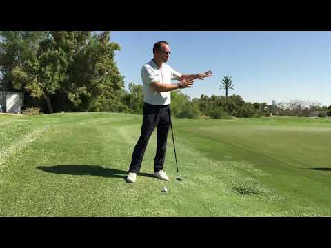 Andy Gorman Golf in Dubai- How to play a chip shot on the downslope