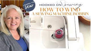 How to Wind a Sewing Machine Bobbin | Learn to Sew | Sewing Basics | Janome Memory Craft 8200 QCP