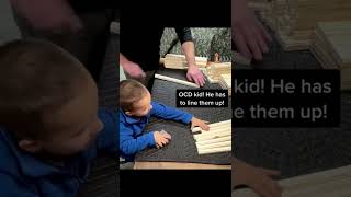 Little Boy Assists Father With Wood Sanding - 1380478