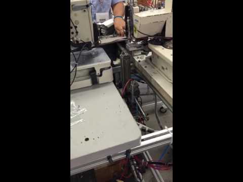 Automated button hole and button sew machine