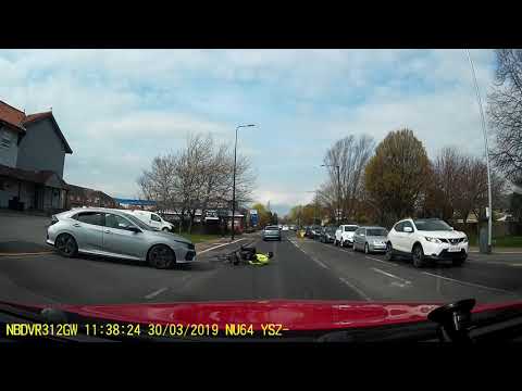 Cyclist does the slowest fall off a bike after car nudges him