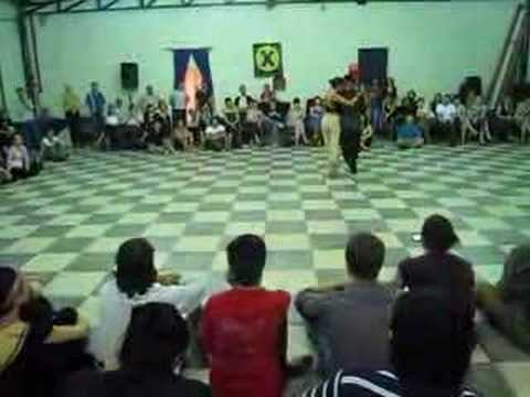  Mario Consiglieri  and  Anabella Diaz-Hojman  are  dancing  to  the  milonga  "  Estampa De Varon  "
