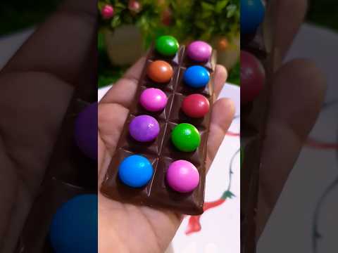 Dairymilk chocolate 🍫&choco Gems popsicle 🍭💘#shorts #ytshorts #shortfeed #chocolate #lollipop #viral