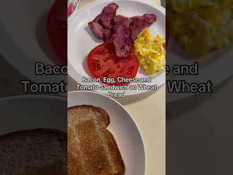Bacon, Egg, Cheese and Tomato Sandwich on Wheat Bread