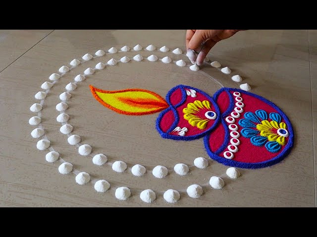 Navaratri rangoli design with diyas by pakka local