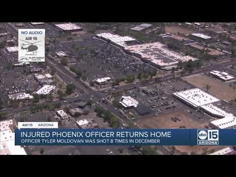 Officer Tyler Moldovan returns home to hero's welcome after shot 8 times