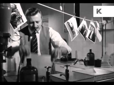 1960s Man Developing Photos in Dark Room, Photographer