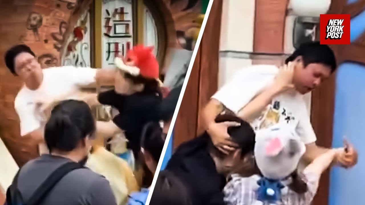 Disneyland meltdown: Grown adults throw punches over photo line - YouTube