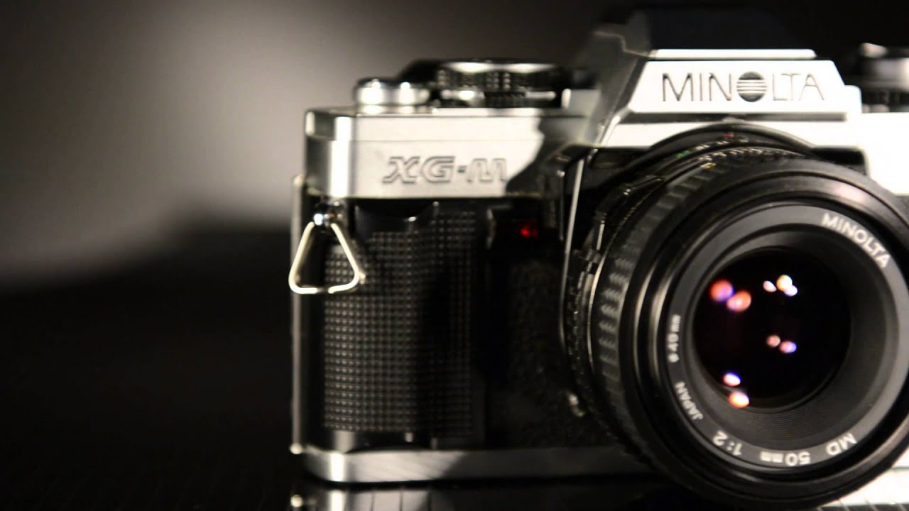 Câmera Analógica Minolta XG-M: Design Clássico e Lentes Profissiona