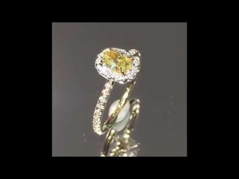 Fancy Yellow Diamond Engagement Ring in Oval Halo