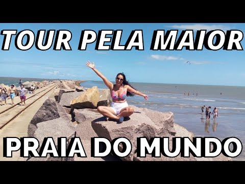 Tour pela maior praia do mundo, dicas de passeio, diversão e muito mais.
