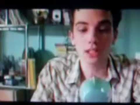 Trailer frame: small-town main street and a hand-painted radio billboard from I'm Reed Fish