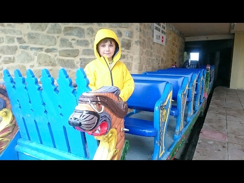 Video for children. Fun stroll in san sebastian amusement theme park. roller coaster