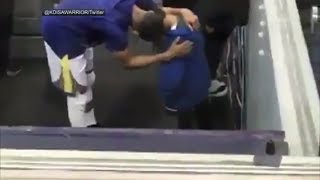 Stephen Curry comforts Devin Harris' nephew after death of his father | ESPN
