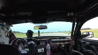 Greg driving the SakaiLMS.org LearnerPrivacy Mustang at 24 Hours of Lemons