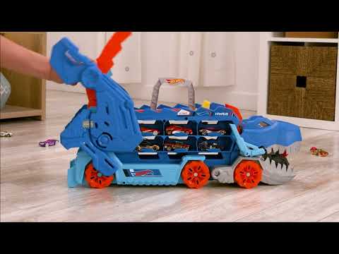thumbnail video image 2 of Pista de juguete Hot Wheels City Súper Remolque de T-Rex, 2 of 5