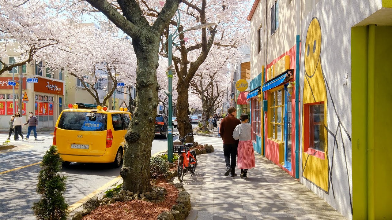 Immersive street-level walking tour through Jeju, South Korea, showcasing authentic urban landscapes, local architecture, and the vibrant atmosphere of the city's neighborhoods