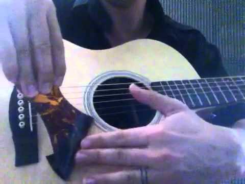 Removing pick guard on acoustic guitar