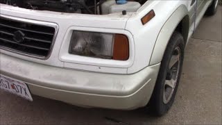 Headlight assembly replacement 97 Suzuki Sidekick