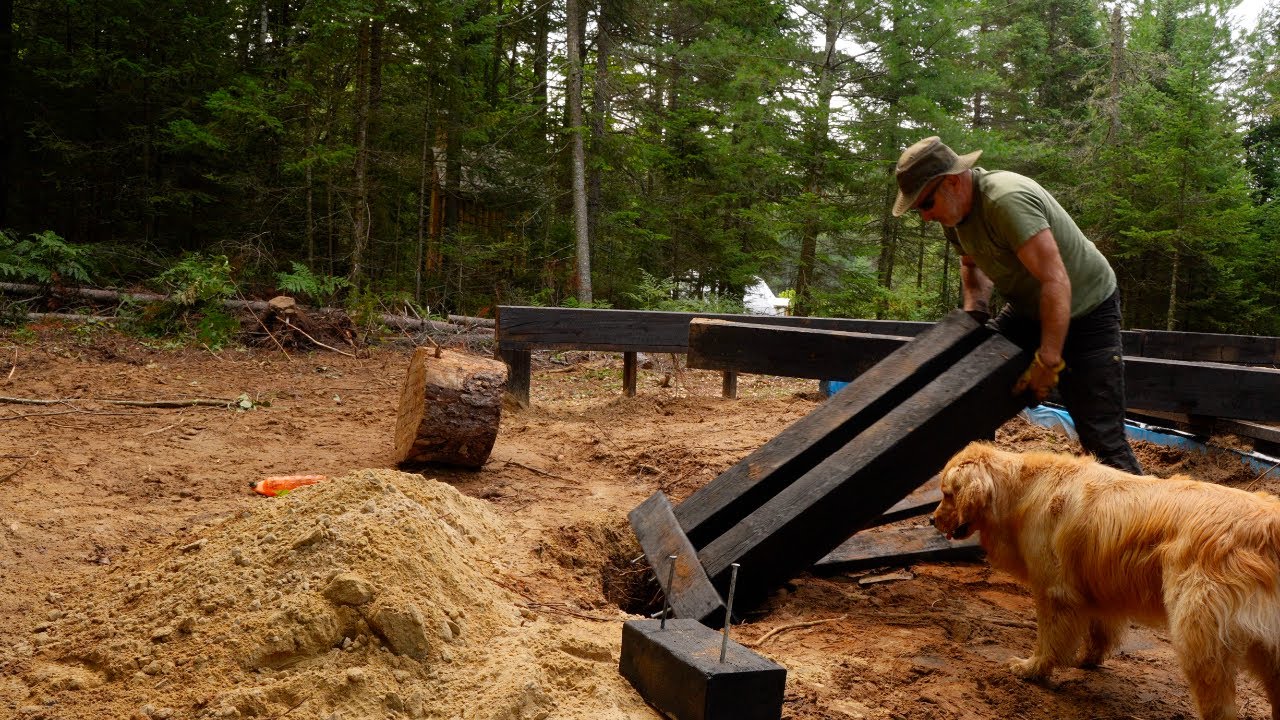 Building a Timber Frame Wood Foundation for a Log Cabin in a Severe Thunderstorm OFF GRID