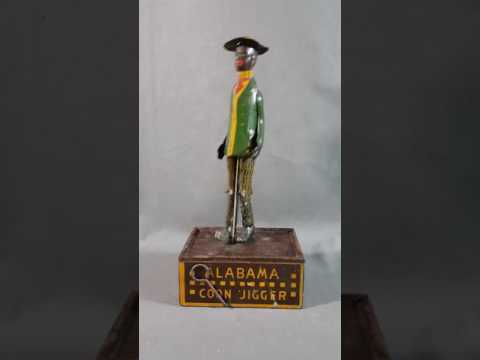 coon jigger wind up toy