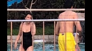 Aishwarya dons a black monokini as she chills in a pool with Abhishek-Aaradhya